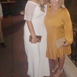 White Wide leg jump suit with lace detail.